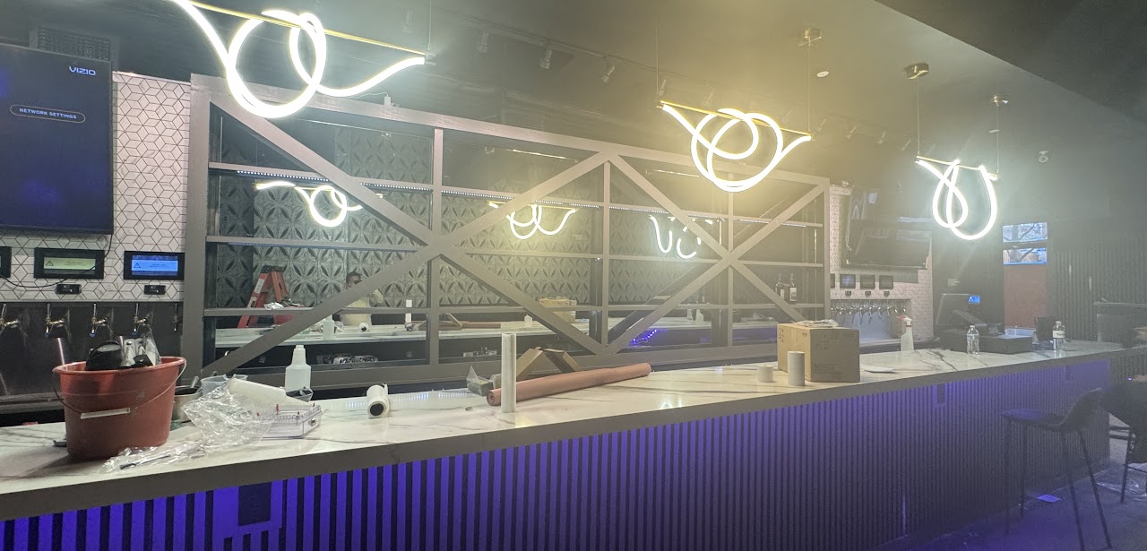Bar with neon & feature wall